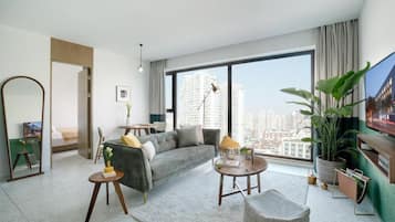 Family Room, Multiple Beds, City View | Living area