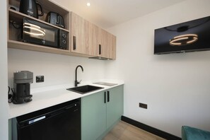 Fridge, microwave, stovetop, coffee/tea maker - The Sixty | Classic 1BDR Apt with Secure Parking (Cardiff)