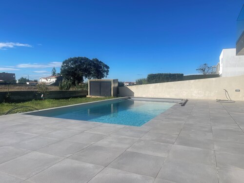 Splendid contemporary villa with beautiful garden and private pool.