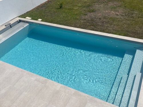 Splendid contemporary villa with beautiful garden and private pool.