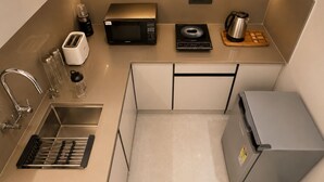 Fridge, microwave, dishwasher, cookware/dishes/utensils - Art Luxury Service Apartment Golf Course Road (Gurugram)