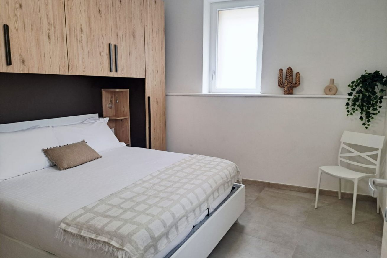2 chambres, fer et planche à repasser