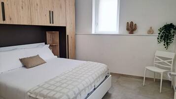 2 chambres, fer et planche Ă repasser
