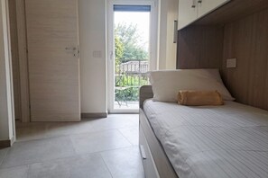 2 slaapkamers, een strijkplank/strijkijzer