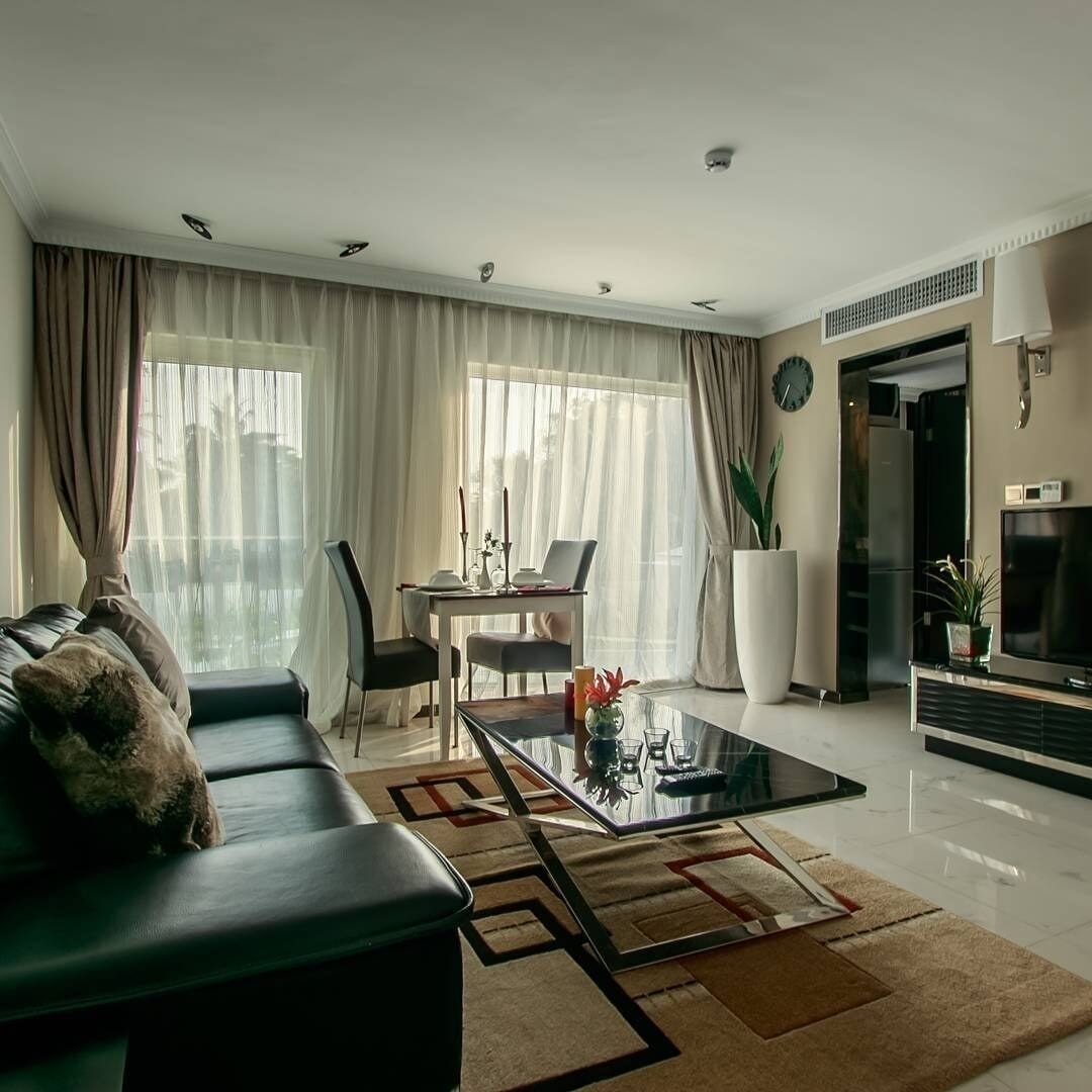 Apartment, Pool View | In-room safe, soundproofing, iron/ironing board, free WiFi