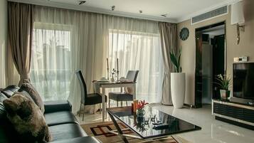 Apartment, Pool View | In-room safe, soundproofing, iron/ironing board, free WiFi