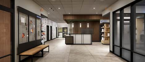 A modern interior with a reception desk, a bench, and a wall with a bulletin board.