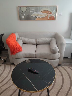 Living area - Modern Cosy Studio in Ruaka Near Two Rivers Fast WiFi and fParking,24/7 Security (Nairobi)