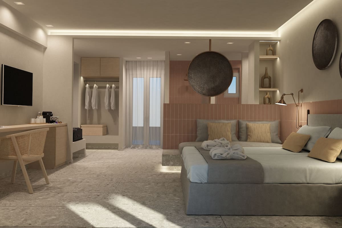 A modern bedroom with a bed, bedside table, and a desk area.