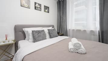 Ropa de cama de alta calidad y cortinas blackout