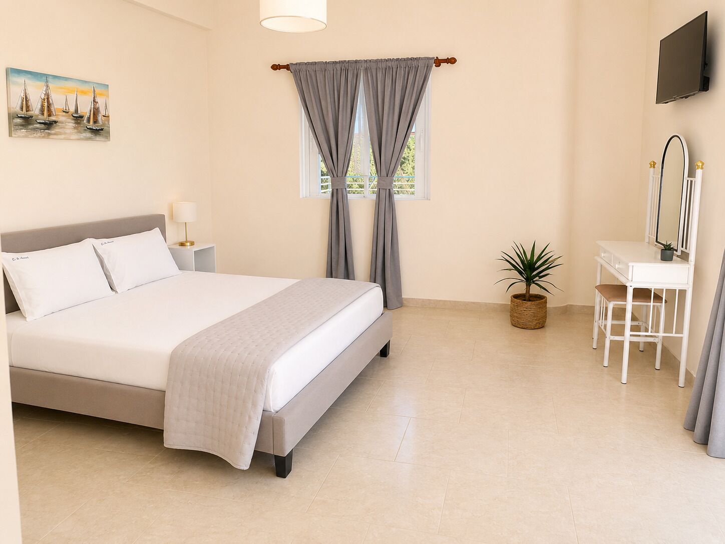 A bedroom with a bed, bedside table, lamp, curtains, a potted plant, a desk with a mirror, and a TV mounted on the wall.