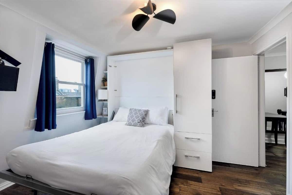 Quarto casal conforto, 1 cama de casal, para não fumantes, vista para a cidade