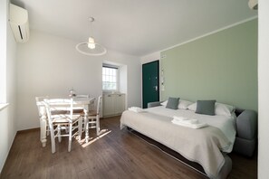 Deluxe appartement, uitzicht op de stad | Woonruimte