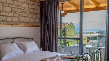Suite panorámica | Ropa de cama hipoalergénica, caja fuerte, decoración individual