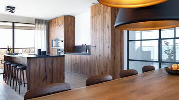 Appartement | Cuisine privée | Chaise haute