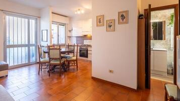 Apartment, Balcony | Living area | Flat-screen TV