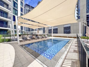 Outdoor pool - PVH - Refined 2BR - Island Park 2 (Dubai)