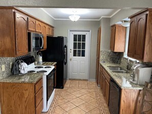 Private kitchen - No Frills 2BR Stay | Work Crews & Extd Stays (Corpus Christi)
