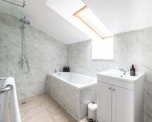 Shower, hair dryer, towels, soap