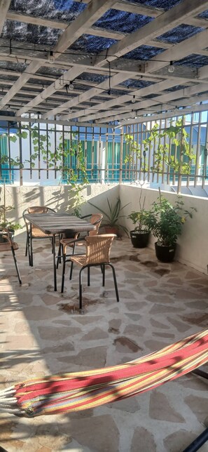 Shared Dormitory, 2 Bedrooms, Balcony, Mountain View | Outdoor dining - Room-secure Building, Walk to Beach, nea (Santa Marta)