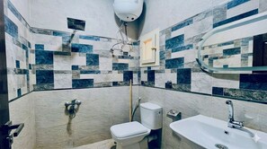 Hair dryer, towels, soap, toilet paper