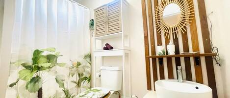 Shower, towels, soap, toilet paper