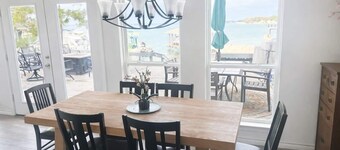 Spacious 5-bedroom, 4-bath lakefront home with modern comforts, scenic views, and plenty of room for family and friends—perfect for a relaxing getaway or fun-filled retreat.