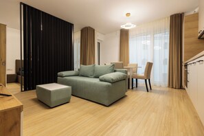 Living area - Nest Inn Jasmine Apartment (Oradea)