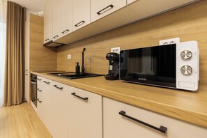 Private kitchen - Nest Inn Jasmine Apartment (Oradea)