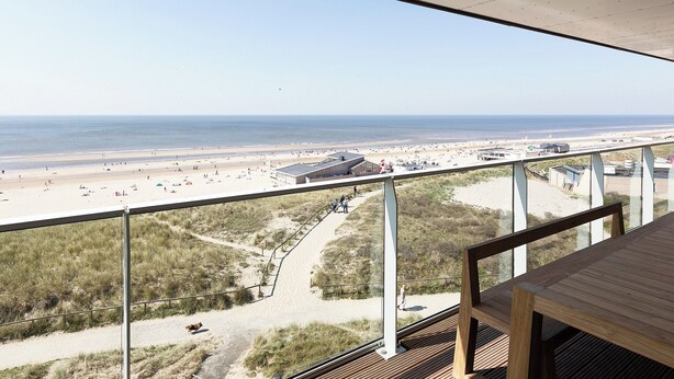 A balcony with a view of a beach and dunes. - Chic Apartment for 8 With Seaview (Egmond aan Zee)