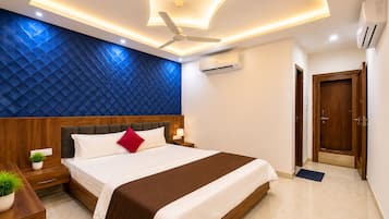 Habitación individual Deluxe, vistas a la ciudad | Ropa de cama