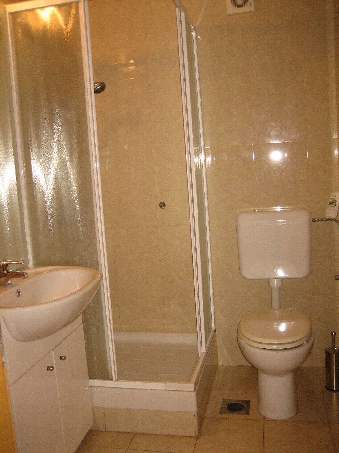 Shower, towels, soap, toilet paper