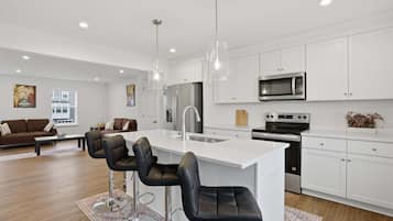 Townhome, 4 Bedrooms | Private kitchen | Fridge, oven, coffee/tea maker, toaster