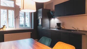 Fridge, microwave, stovetop, cookware/dishes/utensils