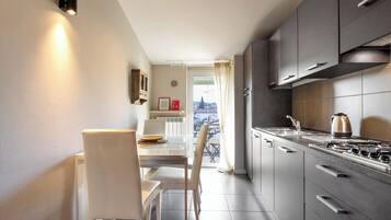 Deluxe Apartment, Balcony | Private kitchen
