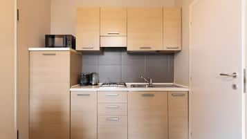 Departamento clásico, balcón | Cocina privada