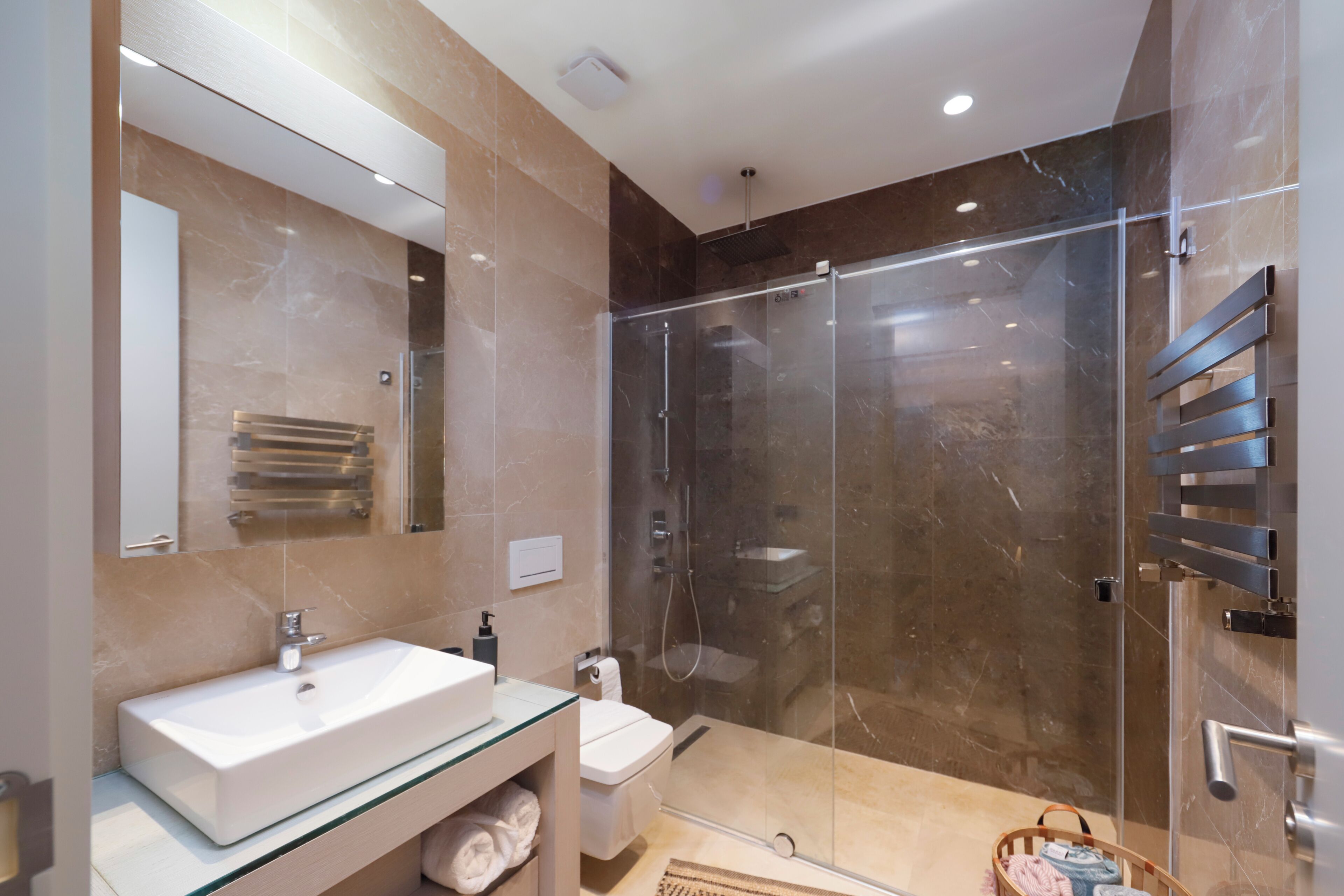 Shower, towels, soap, toilet paper