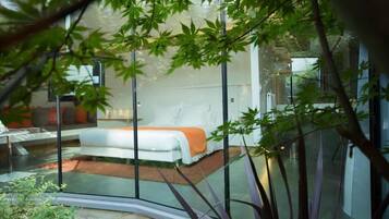 Superior Room, 1 Bedroom, Patio, Garden View | In-room safe, desk, blackout drapes, soundproofing