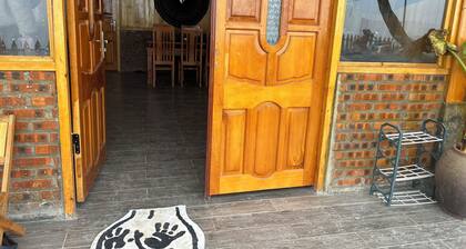 Traditional Hmong house in the heart of the rice fields