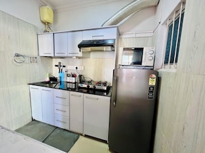 Family Studio Suite, Balcony, Mountain View | Private kitchen - Aizawl Guest House (Aizawl)