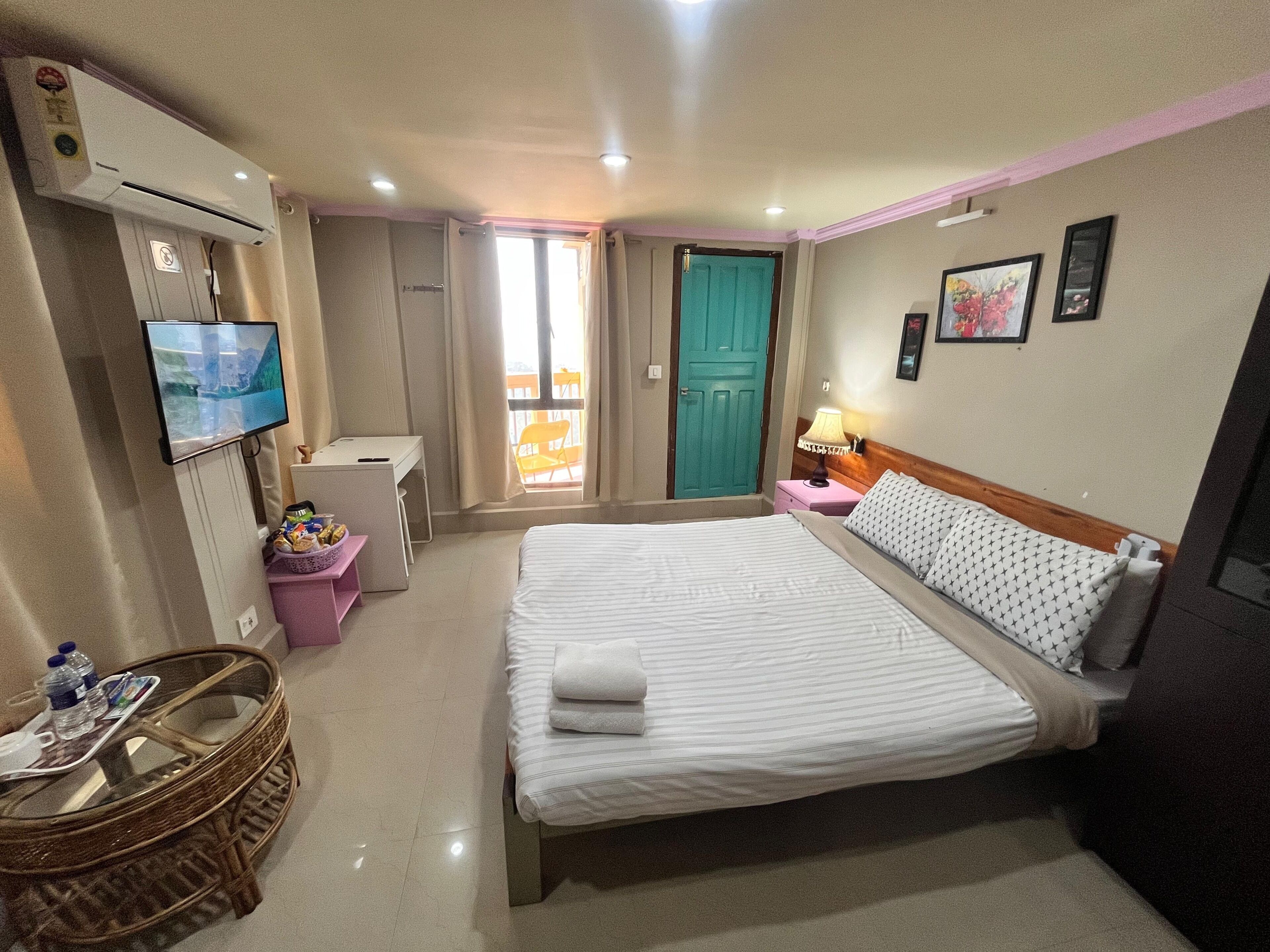 Deluxe Double Room, Balcony, City View | Minibar, blackout drapes, iron/ironing board, free WiFi