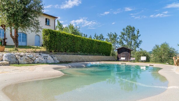 Unclassified image, 1 of 45, button - Villa CàBrandano, view of the hills and a bio-pool (Montecalvo In Foglia)