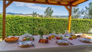 Unclassified image, 2 of 45, button - Villa CàBrandano, view of the hills and a bio-pool (Montecalvo In Foglia)