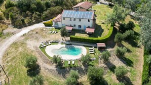 Unclassified image, 5 of 45, button - Villa CàBrandano, view of the hills and a bio-pool (Montecalvo In Foglia)
