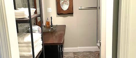 Hair dryer, towels, soap, toilet paper