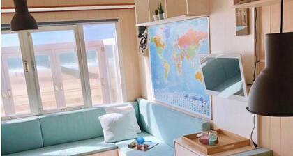 Cozy Beachfront Retreat With Scenic Terrace