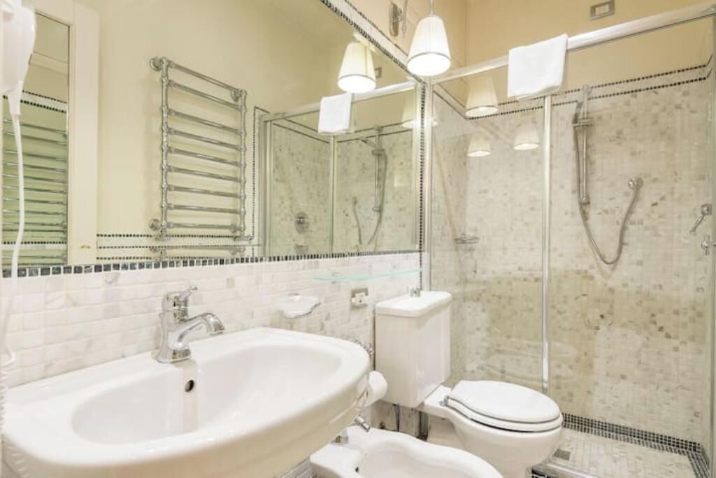 Hair dryer, bidet, towels, soap