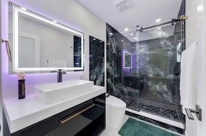 Hair dryer, towels, soap, shampoo