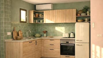 Apartamento, sacada | Cozinha privada