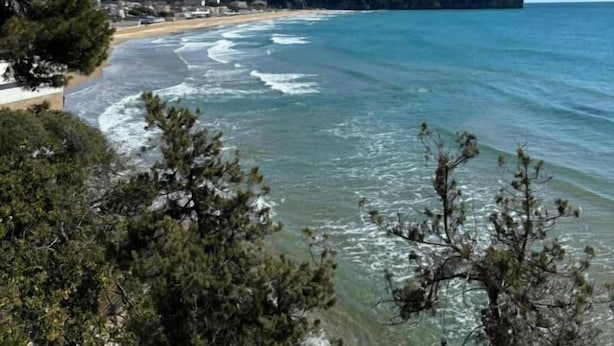 A coastal landscape with a beach, clear blue sky, and a prominent hill. - IL PALAZZETTO GAETA (Gaeta)